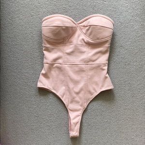 Baby pink faux suede strapless bodysuit !